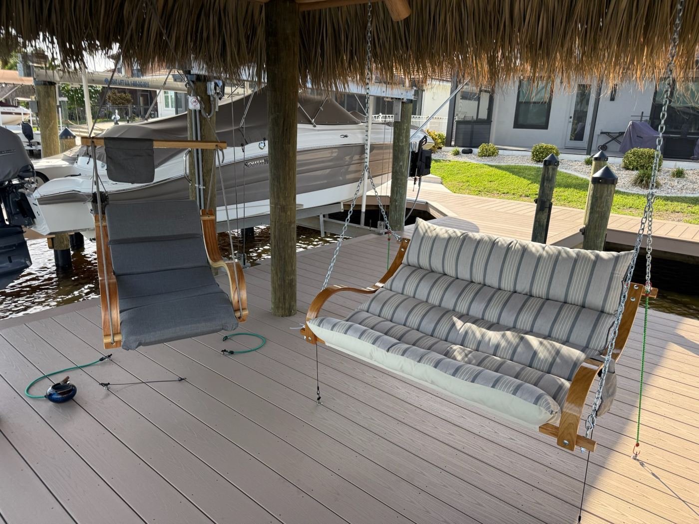 Swing chairs under the tiki
