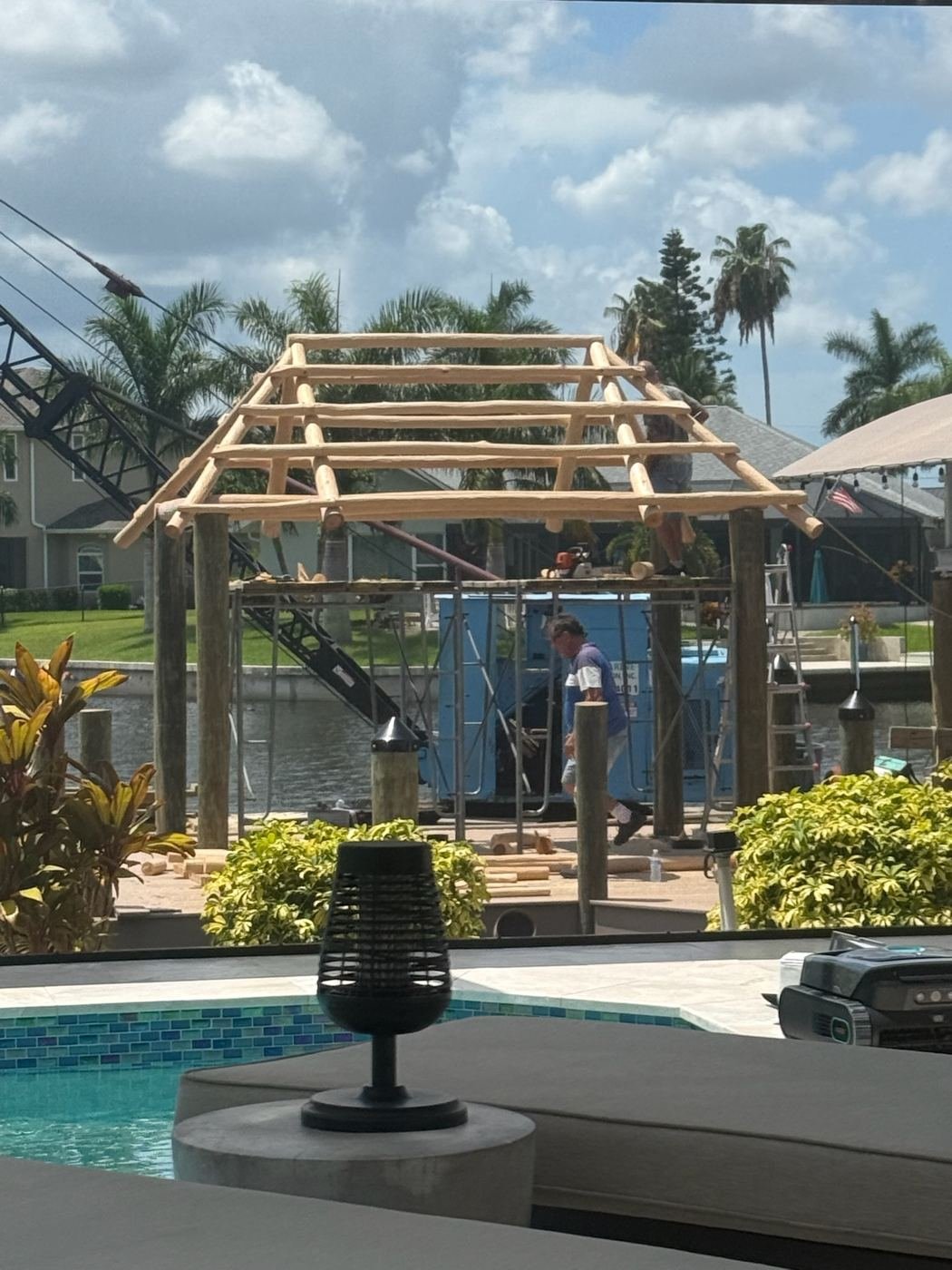The tiki frame goes up on the new dock