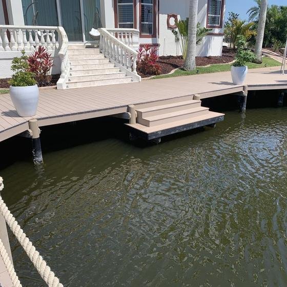 Vinyl dock with wide steps down toward the water
