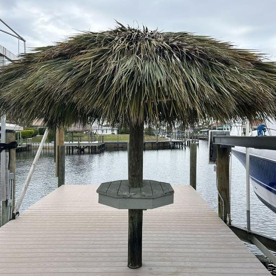 Tiki hut with a built-in octagonal table